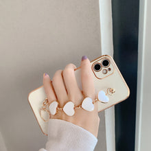 Load image into Gallery viewer, 2021 Luxury Plating Heart Fabric Bracelet Hand Holder Cover for iPhone
