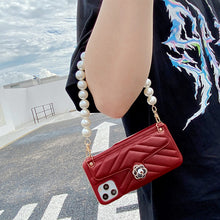 Load image into Gallery viewer, 2021 Luxury Brand Leather Pearl Bracelet Case For iPhone
