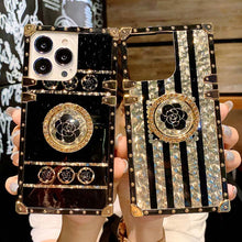 Load image into Gallery viewer, 2021 Luxury Brand Black Rose Flower Stripe Glitter Gold Square Case For iPhone &amp; Samsung With Ring and Wristband
