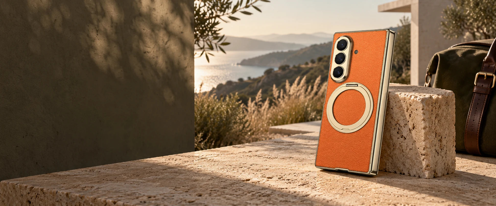 Orange foldable case in a sunlit outdoor setting
